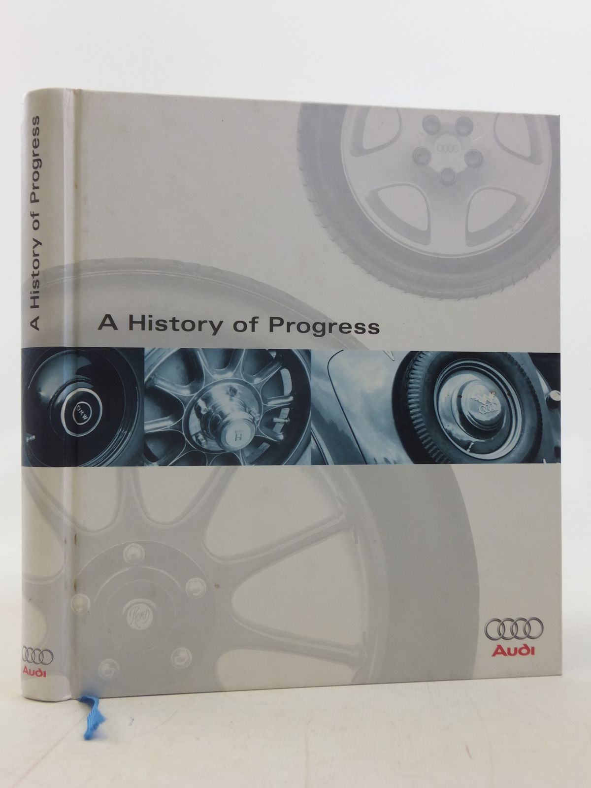 Cover of A HISTORY OF PROGRESS: CHRONICLE OF THE AUDI AG by Peter Kirchberg; Thomas Erdmann; Ralph Plagmann