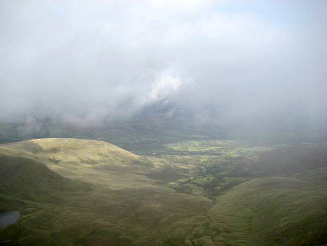 View from Penyfan with the mist rolling in