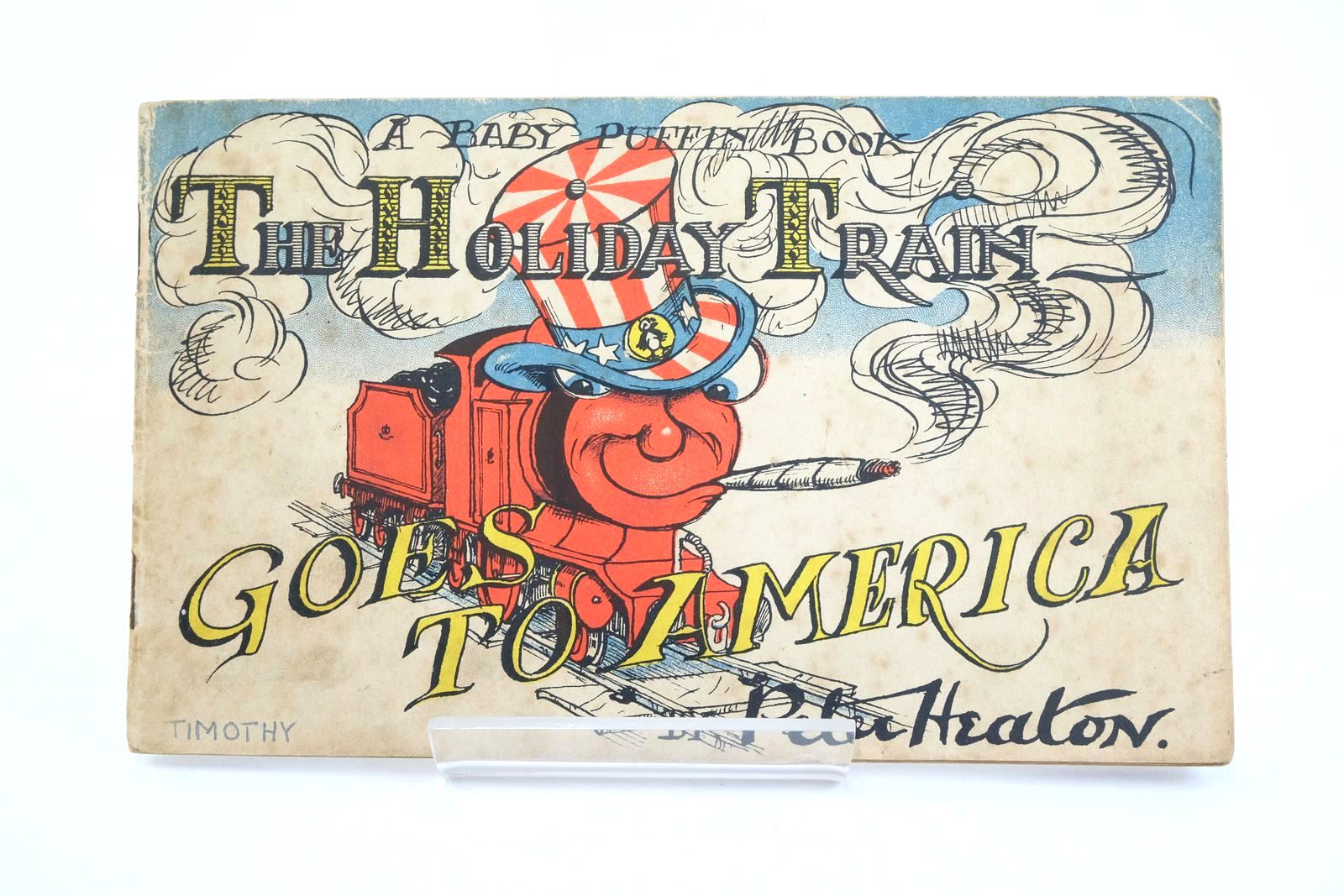 Photo of THE HOLIDAY TRAIN GOES TO AMERICA written by Heaton, Peter illustrated by Heaton, Peter published by Penguin Books Ltd (STOCK CODE: 1323669)  for sale by Stella & Rose's Books