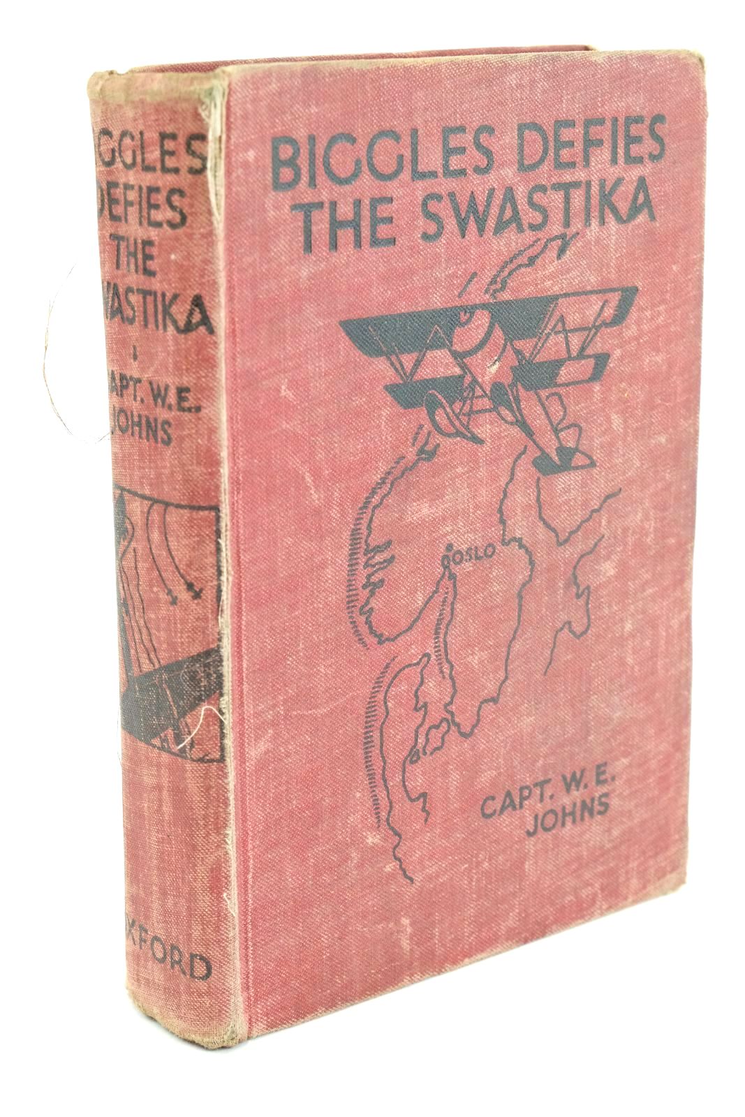 Photo of BIGGLES DEFIES THE SWASTIKA written by Johns, W.E. illustrated by Leigh, Howard
Sindall, Alfred published by Oxford University Press (STOCK CODE: 1324864)  for sale by Stella & Rose's Books