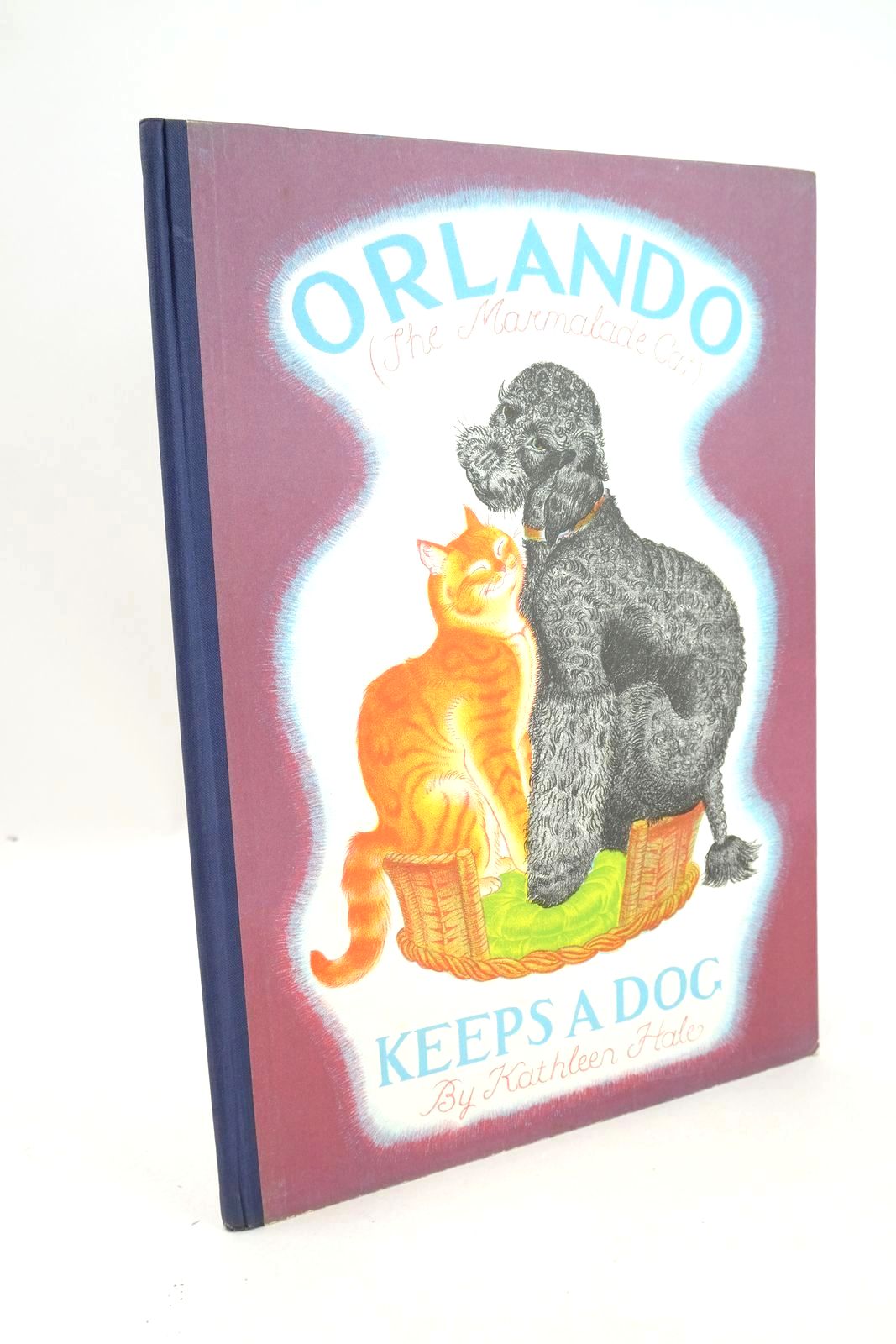 Photo of ORLANDO (THE MARMALADE CAT) KEEPS A DOG- Stock Number: 1325735