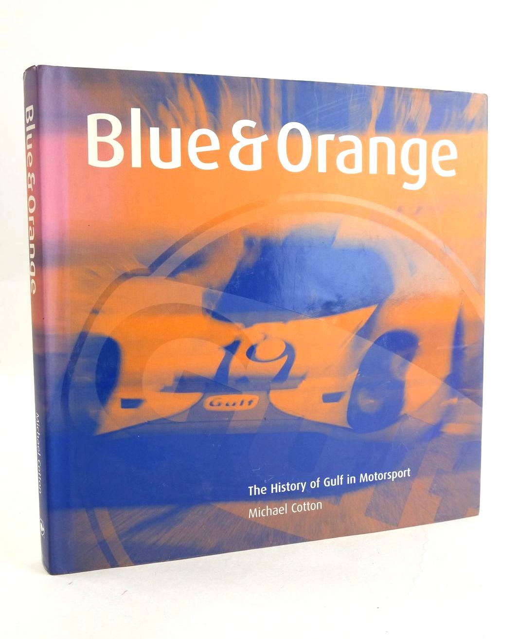 Photo of BLUE &amp; ORANGE: THE HISTORY OF GULF IN MOTORSPORT written by Cotton, Michael published by Coterie Press Limited (STOCK CODE: 1330538)  for sale by Stella & Rose's Books