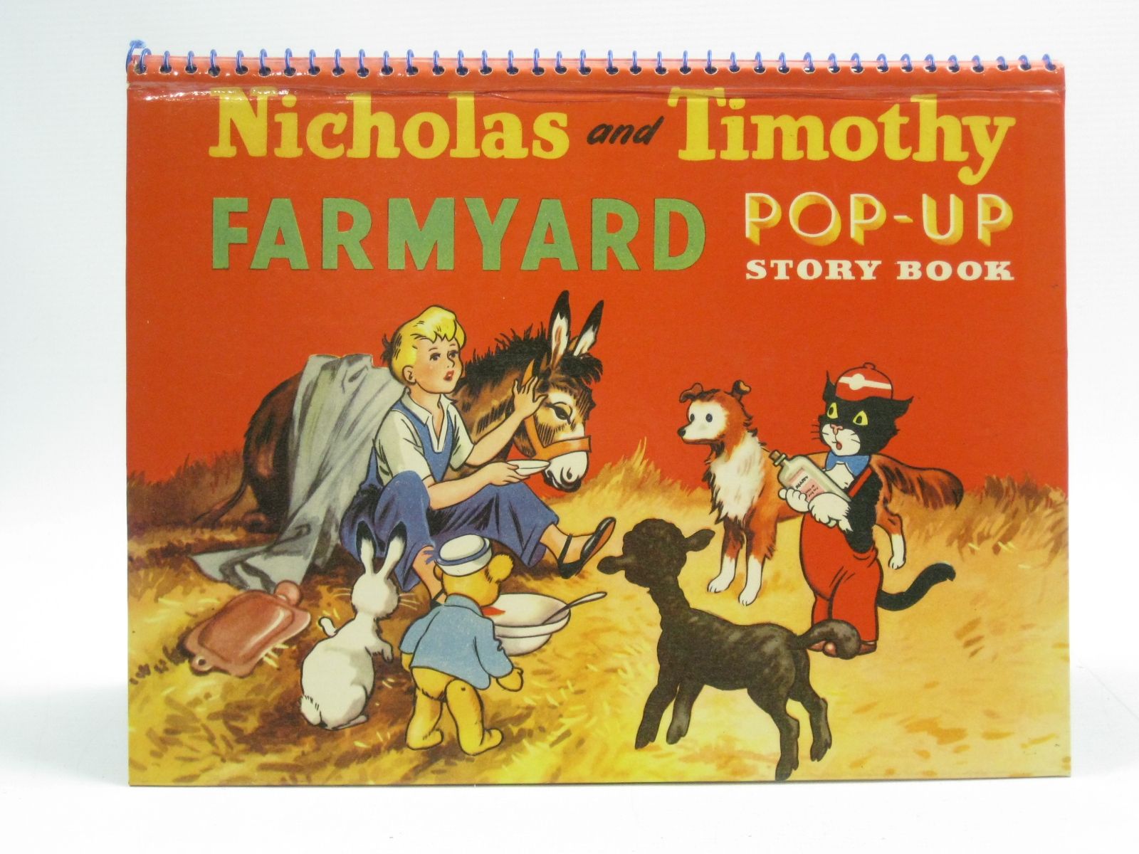Photo of NICHOLAS AND TIMOTHY FARMYARD POP-UP STORY BOOK- Stock Number: 1404434