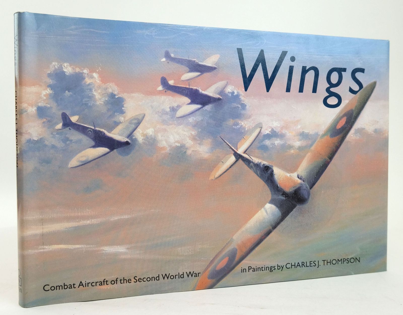 Photo of WINGS: COMBAT AIRCRAFT OF THE SECOND WORLD WAR IN PAINTINGS written by Thompson, Charles J. illustrated by Thompson, Charles J. published by Pan Books (STOCK CODE: 1820204)  for sale by Stella & Rose's Books