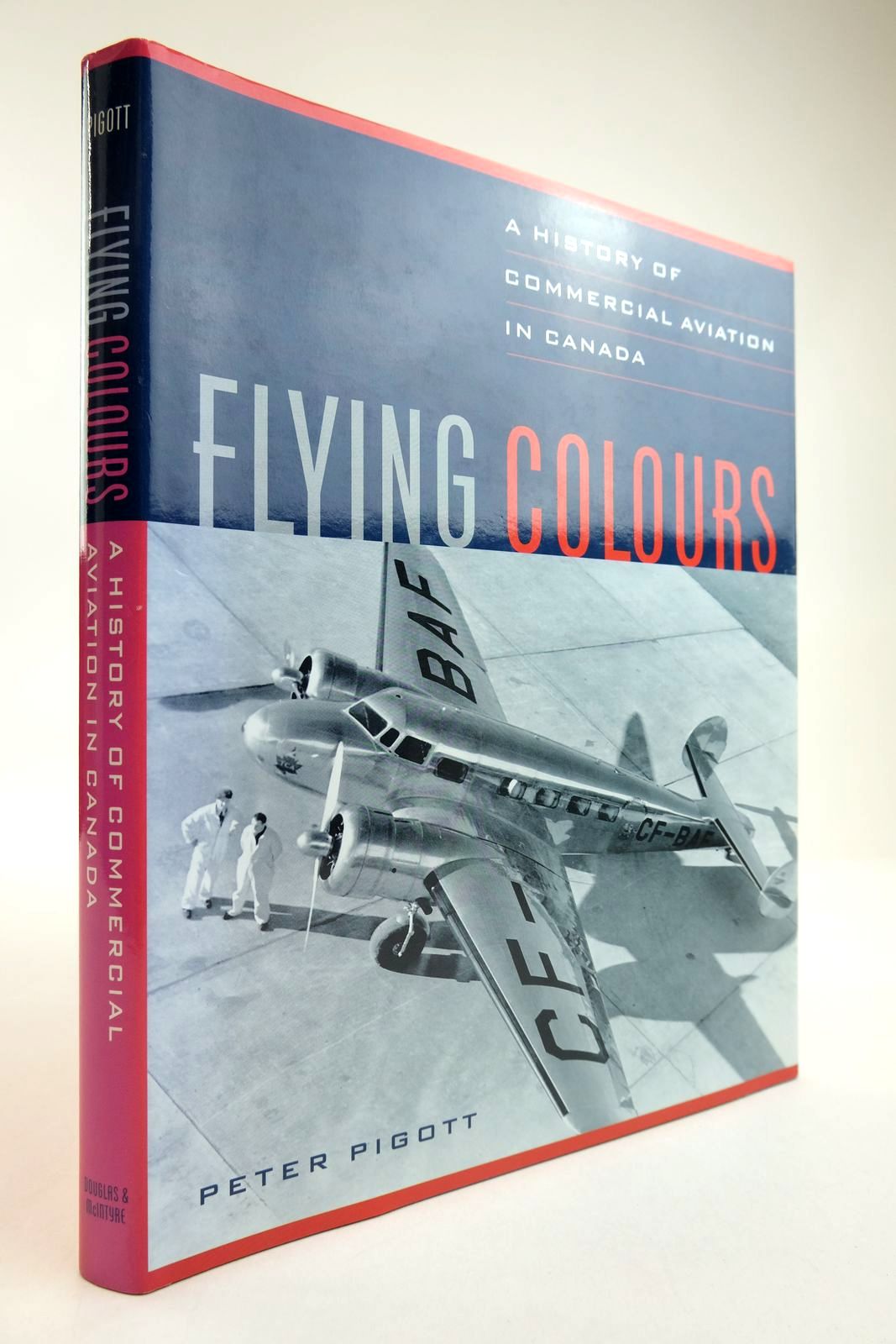 Photo of FLYING COLOURS: A HISTORY OF COMMERCIAL AVIATION IN CANADA- Stock Number: 2134235